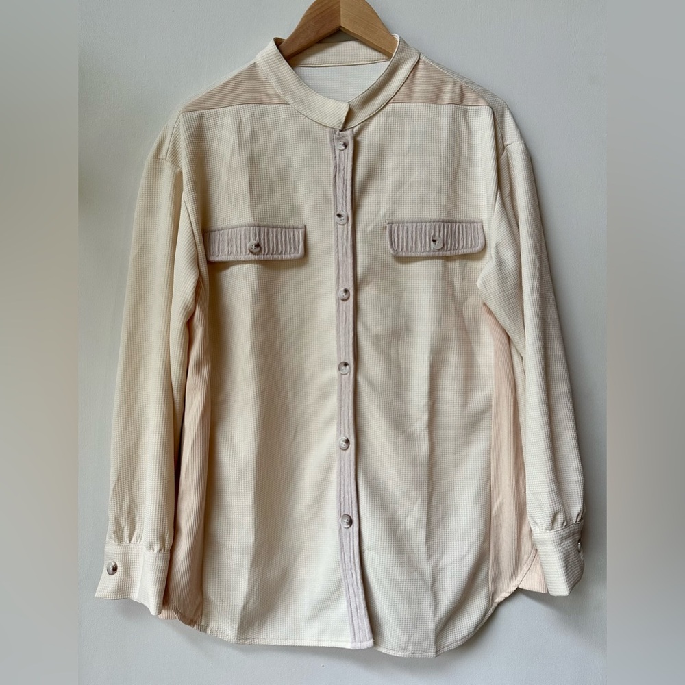 Never worn size Medium crème button down.
